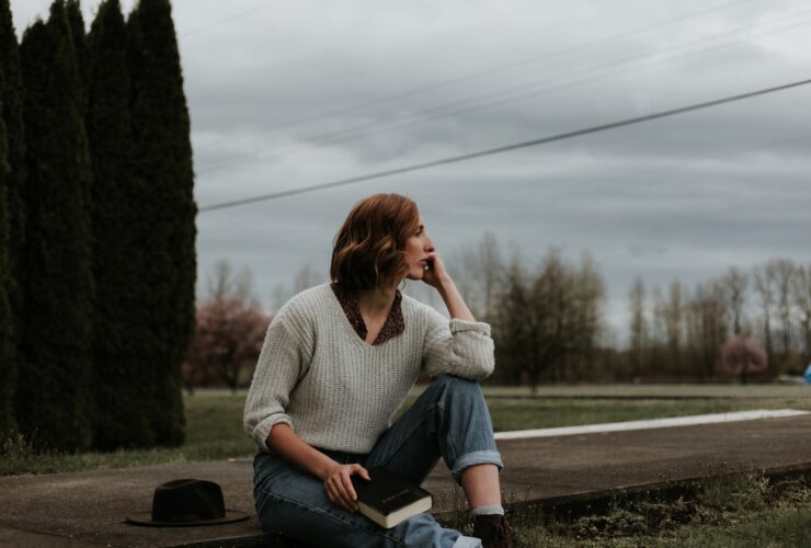 woman sitting on ground